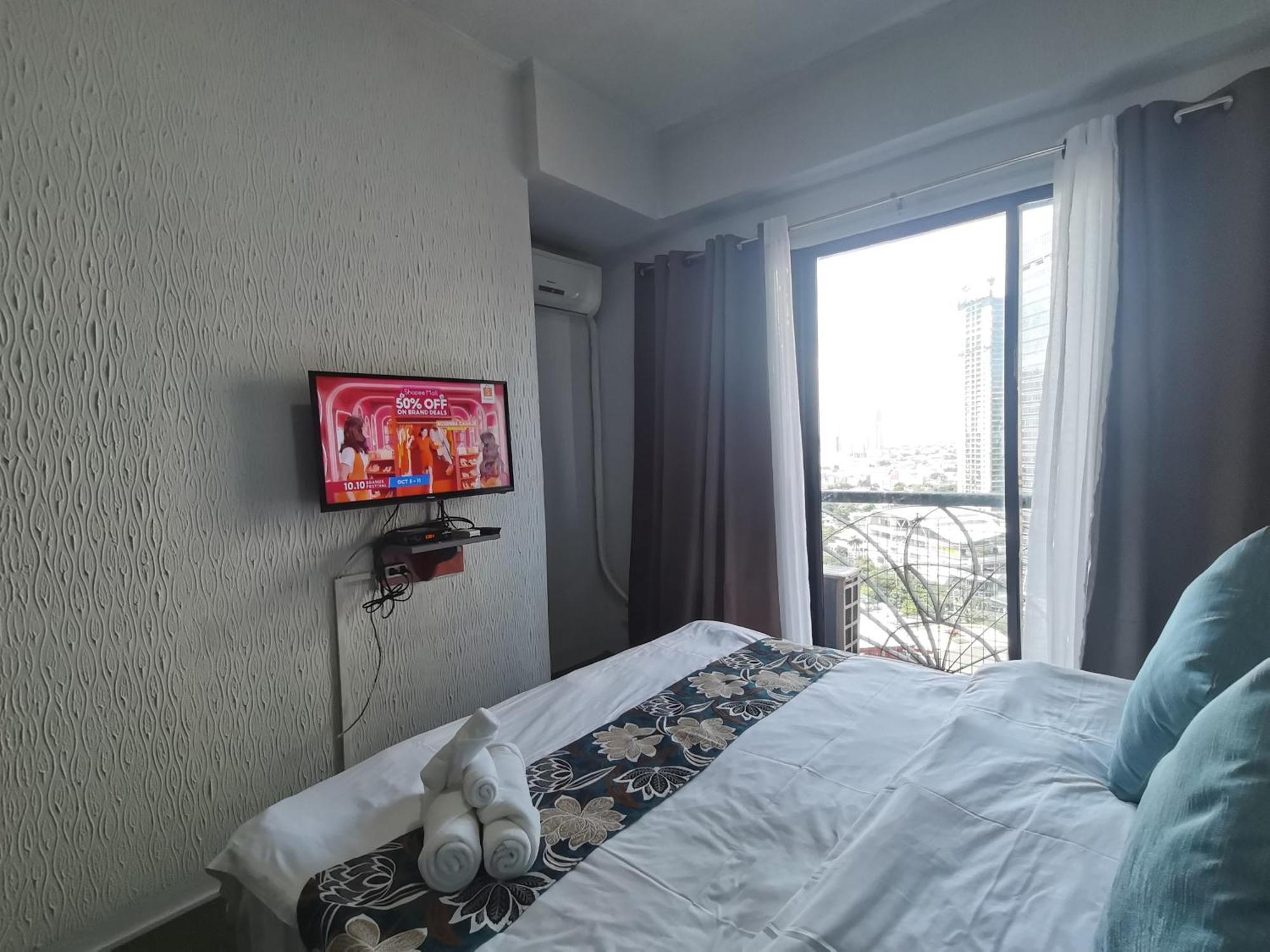 Апарт отель Warm Makati Макати Экстерьер фото